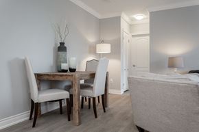 Hamilton apartment for rent - A dining room with a wooden table and chairs.