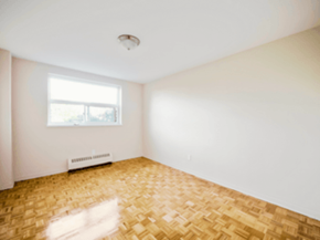 Brampton apartment for rent - A room with a window and a radiator on the floor.