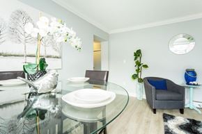 Hamilton apartment for rent - A dining room with a glass table and chairs.