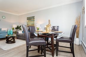 Hamilton apartment for rent - A dining room with a table set for two.