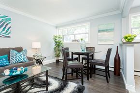 Hamilton apartment for rent - A dining room with a glass table and chairs.