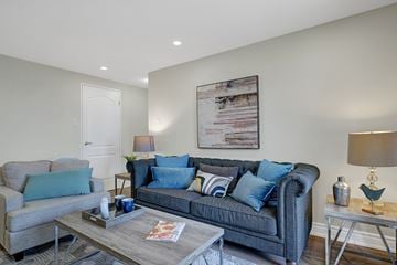Cambridge apartment for rent - A living room with a grey couch and a coffee table.