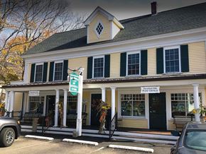 Scituate apartment for rent - a building with a street sign in front of it