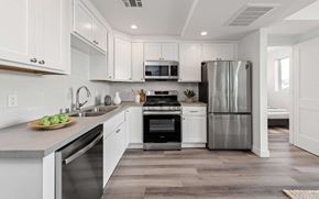 Los Angeles apartment for rent - a kitchen with white cabinets and stainless steel appliances