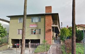 Los Angeles apartment for rent - a house with a red and white sign on the side of it