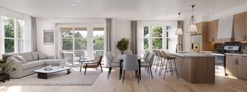 Bozeman apartment for rent - A modern kitchen and living room with a dining table set up.