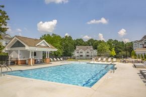 Raleigh apartment for rent - our apartments have a resort style pool with lounge chairs