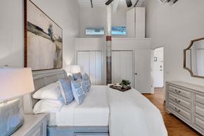 Augusta apartment for rent - A bedroom with a large bed and a painting on the wall.
