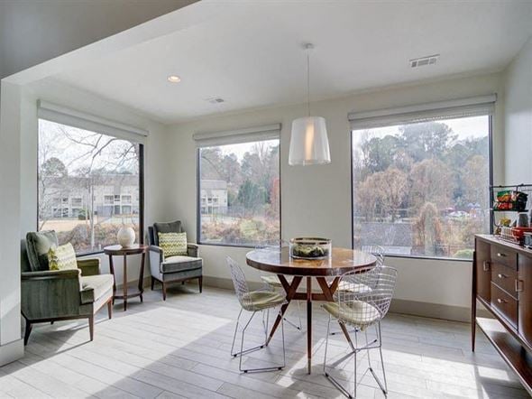 Decatur apartment for rent - a living room with a table and chairs and a large window