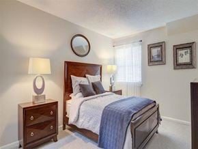 Decatur apartment for rent - a bedroom with a bed and two night stands