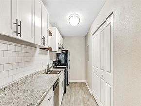 Decatur apartment for rent - a kitchen with a stove and a sink