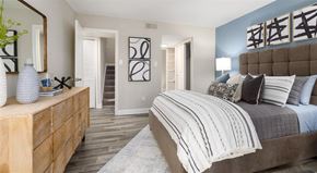 Raleigh apartment for rent - a bedroom with a bed and a dresser