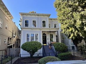 Sacramento apartment for rent - a white house with stairs in front of it