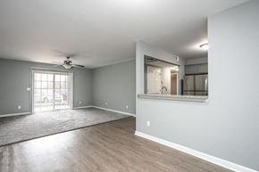 Bardstown apartment for rent - A spacious room with a ceiling fan and a window with blinds.