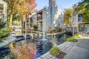 Fairfield apartment for rent - A fountain in the middle of a courtyard surrounded by buildings.