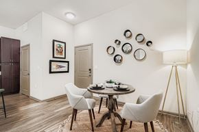 Huntersville apartment for rent - A dining room with a round table and chairs.