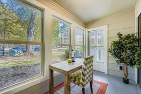 Roswell apartment for rent - A dining room with a table and chairs.