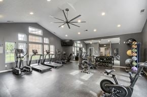 Canal Winchester apartment for rent - A spacious gym with treadmills, exercise bikes, and other equipment.