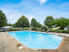Columbus apartment for rent - A pool with a no diving sign in the foreground.