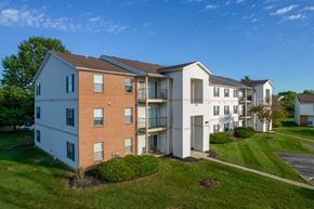 Canal Winchester apartment for rent - an aerial view of an apartment building on a green lawn