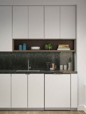 New York apartment for rent - a white kitchen with white cabinets and a black counter top