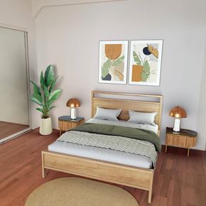 Portland apartment for rent - a bedroom with a bed and two paintings on the wall