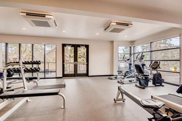 Portland apartment for rent - A spacious gym with treadmills, weights, and exercise equipment.