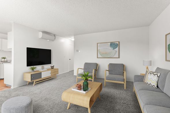 Portland apartment for rent - Living room with grey couch at Garden Villa Apartments, Portland, OR, 97266