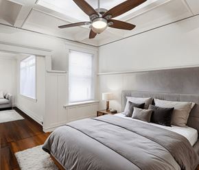 Portland apartment for rent - A bedroom with a large bed and a ceiling fan at Midtown Apartments, Portland, 97209