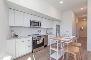 Portland apartment for rent - a kitchen or kitchenette at olympic view london stratford apartment at Brookland Apartments, Portland, OR 97202
