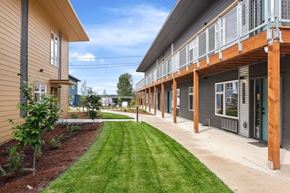 Portland apartment for rent - a grassy area in front of a building