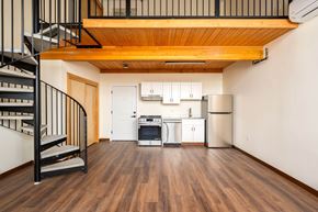 Portland apartment for rent - Kitchen with a staircase view at Sandy Rose Lofts, Oregon, 97232