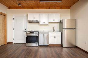 Portland apartment for rent - Kitchen with refrigerator at Atomic Orchard Experiment, Portland