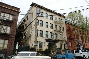 Portland apartment for rent - an apartment building on the corner of a city street