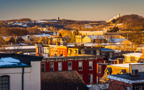 York apartment for rent - a view of a city with roofs covered in snow