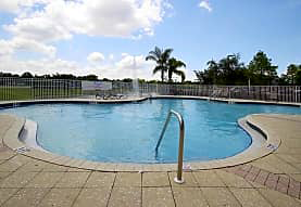 Ellenton apartment for rent - a large pool with a fence around it