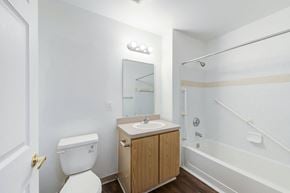 Carrboro apartment for rent - a bathroom with a toilet sink and shower at Carolina Springs Apartments, Carrboro