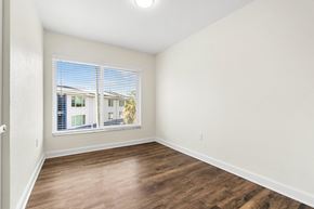 St. Petersburg apartment for rent - A room with a window overlooking a building.