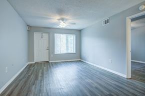 Palm Beach apartment for rent - A room with a white door and a window with blinds.