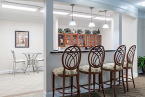 Manassas Park apartment for rent - A dining room with a table and chairs.