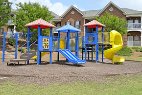Lawrenceville apartment for rent - a playground with a blue and yellow swing set