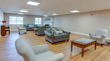 Woodbridge apartment for rent - A living room with a grey couch and a wooden coffee table.