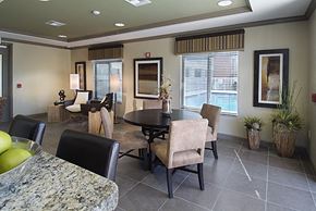 Homestead apartment for rent - a dining room and living room with a table and chairs