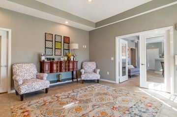 Woodbridge apartment for rent - A living room with a rug and two chairs.