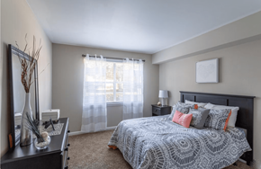 North Charleston apartment for rent - a bedroom with a large bed and a large window at Bradley Square, South Carolina, 29406
