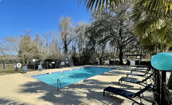 Pool with relaxing chairs