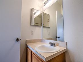 Punta Gorda apartment for rent - a bathroom with a sink and a mirror