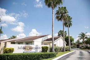 Homestead apartment for rent - A sign for Jubilee Country Club is in front of a building.