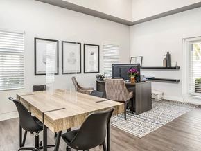 Fort Lauderdale apartment for rent - A dining room with a wooden table and chairs.