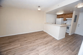 Miami apartment for rent - A kitchen area with a counter and cabinets.
